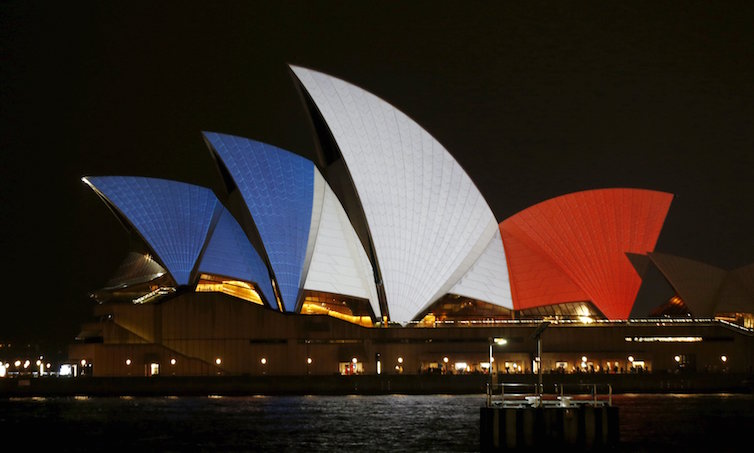 The blue, white and red colours of France's national flag are projected onto the sails of Sydney's Opera House in Australia November 14, 2015 following the attacks in Paris.      REUTERS/Jason Reed      TPX IMAGES OF THE DAY